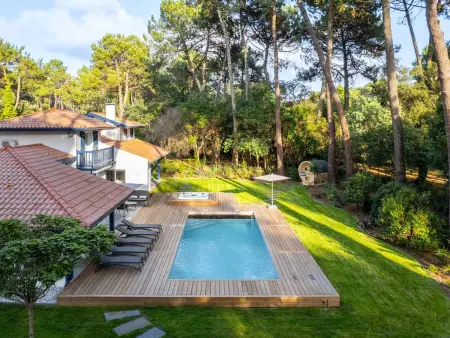 Villa de luxe avec piscine chauffée, jacuzzi, sauna au cœur de la forêt des Landes - Photo 1