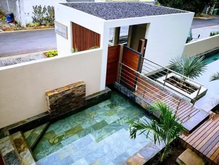 Appartement charmant à Flic en Flac avec piscine partagée - Photo 7
