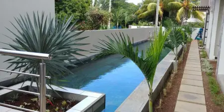Appartement charmant à Flic en Flac avec piscine partagée - Photo 15
