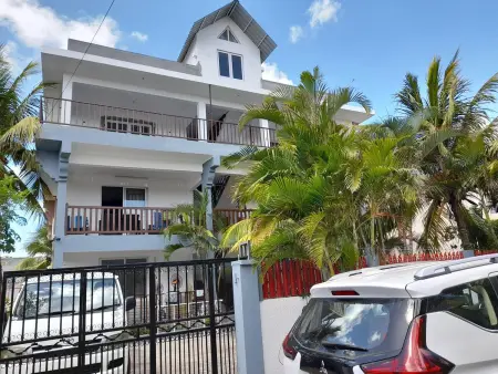Appartement lumineux à Trou aux Biches - 70 m² - Vue sur jardin - Photo 6