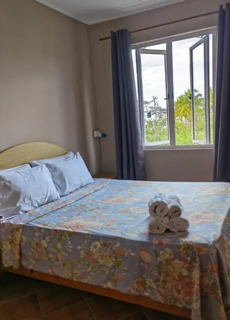 Appartement lumineux à Trou aux Biches - 70 m² - Vue sur jardin - Photo 7