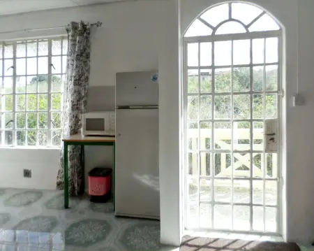 Appartement spacieux à Calodyne avec jardin clos - Photo 5