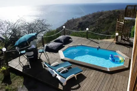 Villa élégante avec vue sur mer et montagne au Carbet - Photo 11