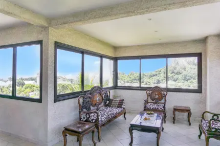 Superbe appartement à Petite Île avec vue mer et montagne. - Photo 2