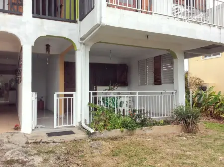 Appartement spacieux à Petit Canal - 65 m² - Vue sur jardin - Photo 12