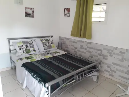 Appartement charmant à Saint-Joseph avec jardin et terrasse, 60 m² - Photo 2