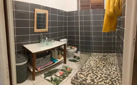 Appartement avec vue jardin à Deshaies 80 m² avec piscine - Photo 6