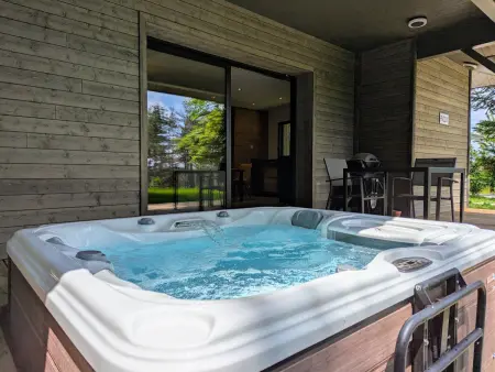 Lodge élégant avec spa privatif et espace bien-être - Photo 1