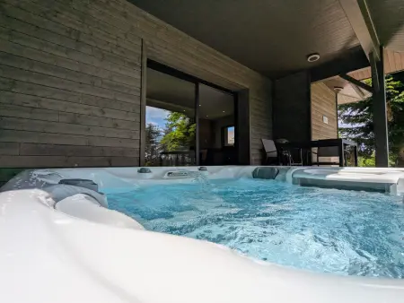 Lodge élégant avec spa privatif et espace bien-être - Photo 13