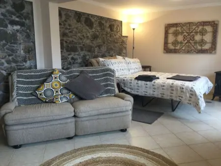 Cottage aus Stein mit Blick auf das Wasser, Maison 5 personnes à Arco da Calheta - Photo 14
