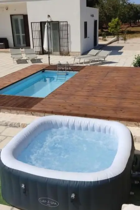 Rundes Steinhaus mit Whirlpool, Maison 9 personnes à San Vito Dei Normanni - Photo 25