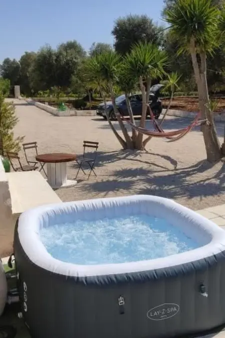 Rundes Steinhaus mit Whirlpool, Maison 9 personnes à San Vito Dei Normanni - Photo 26