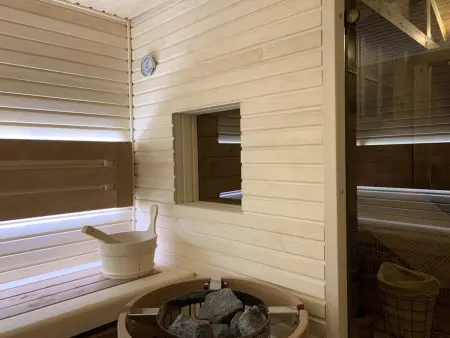 Die Ski-Suite hat ein Schlafzimmer und ein kleines Wohnzimmer ohne Küche. - Photo 41