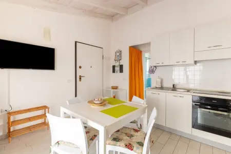 ATTICO BADESI CON PISCINA, Grenier avec terrasse et piscine en copropriété - Photo 5