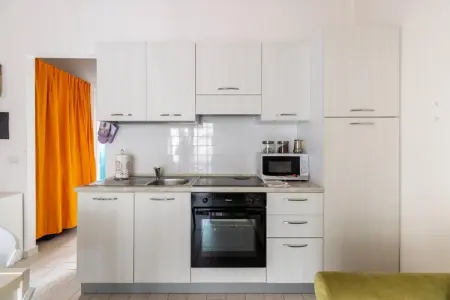 ATTICO BADESI CON PISCINA, Grenier avec terrasse et piscine en copropriété - Photo 6