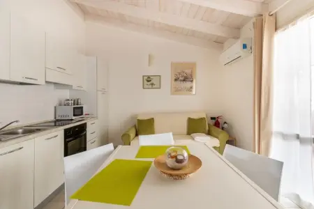 ATTICO BADESI CON PISCINA, Grenier avec terrasse et piscine en copropriété - Photo 8
