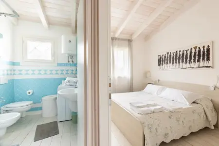 ATTICO BADESI CON PISCINA, Grenier avec terrasse et piscine en copropriété - Photo 18