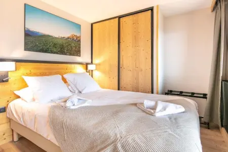 Les Hauts de Vaujany -Appartement 2 piÃ¨ces avec coin nuit 6 personnes, Séjour confortable avec alcôve de couchage - Photo 3