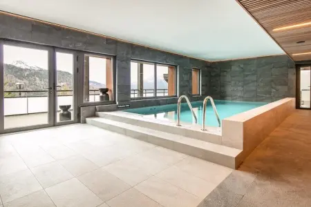 Les Hauts de Vaujany -Appartement 2 piÃ¨ces avec coin nuit 6 personnes, Séjour confortable avec alcôve de couchage - Photo 12