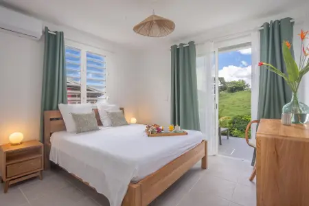 Bas de villa chaleureuse avec piscine privée, Maison 6 personnes à Le Carbet - Photo 2