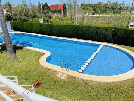 Duplex charmant à Oliva avec vue sur jardin et piscine collective - Photo 3