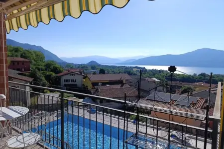 Le Chat Noir, Superbe appartement avec piscine et vue sur le lac - Photo 15
