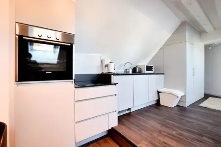 Koetshuis Studio, Demeure moderne avec barbecue à Robertville - Photo 1