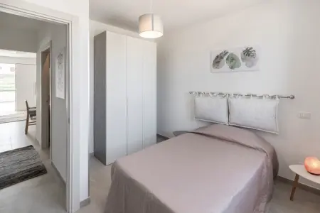 La casa di Isotta, Élégante maison de vacances à Locogrande avec jardin - Photo 14