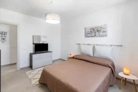 La casa di Isotta, Élégante maison de vacances à Locogrande avec jardin - Photo 16