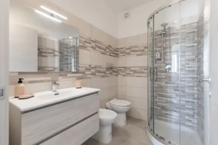 La casa di Isotta, Élégante maison de vacances à Locogrande avec jardin - Photo 18