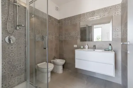 La casa di Isotta, Élégante maison de vacances à Locogrande avec jardin - Photo 20