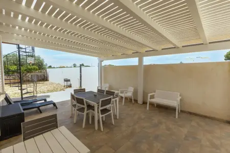 La casa di Isotta, Élégante maison de vacances à Locogrande avec jardin - Photo 26