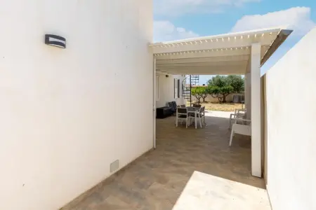 La casa di Isotta, Élégante maison de vacances à Locogrande avec jardin - Photo 28