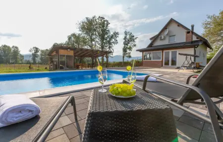 Location Maison 8 personnes à Smiljan - Photo 7