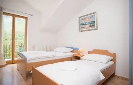 Location Maison 12 personnes à Rastovac - Photo 28