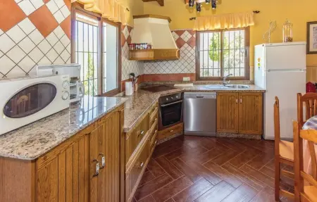 Location Maison 10 personnes à Periana - Photo 18