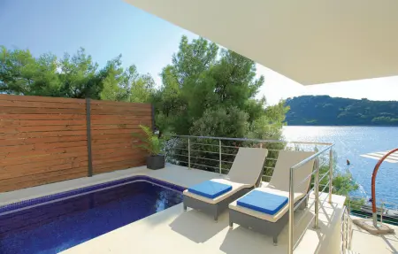 Location Maison 12 personnes à Karbuni - Photo 8