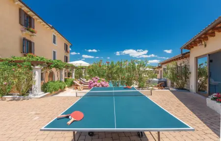 Location Maison 10 personnes à Tinjan - Photo 19