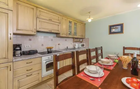 Location Maison 10 personnes à Tinjan - Photo 35