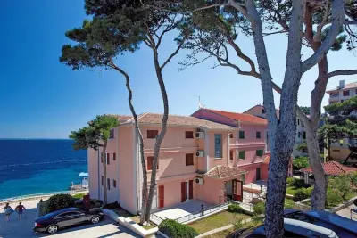 Appartement à Veli Losinj, Apartments Punta, Veli Losinj-3-Raum-App., A3 (3+2), ca. 60 qm, für 5 Pers. - L877882