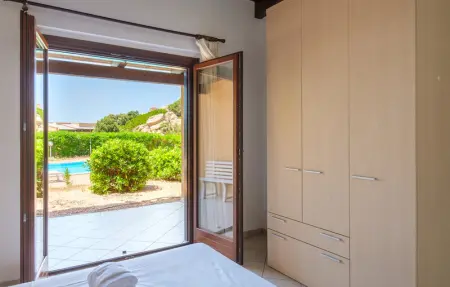 Location Maison 8 personnes à Trinità d'Agultu - Photo 24