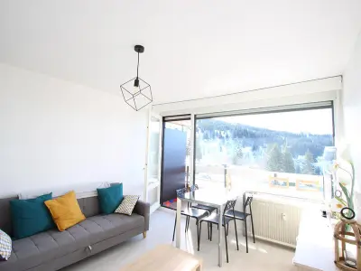 Appartement à Chamrousse, Studio cabine sud avec balcon, proche des pistes et commerces, à Chamrousse 1650 - L966405