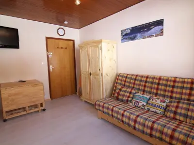 Appartement à Huez, Studio cosy pour 2 pers., proche télésiège et commerces, avec TV, casier à skis, et options confort - L946001