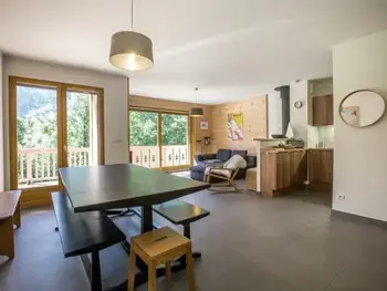 Chalet in La Clusaz,Demi-chalet moderne avec poêle, garage, proche pistes - 6-8 personnes FR-1-304-2 N°831173