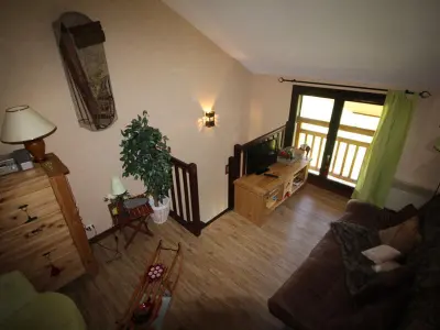 Appartement à Auris, Triplex confort à 400m des pistes, 3 niveaux, 2 chambres, casier à skis, parking gratuit, Auris en Oisans - L882245