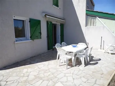 Maison à Marseillan Plage, Maison mitoyenne duplex avec terrasse, garage et parking, proche plage, équipée pour 4 à 6 personnes - L831280