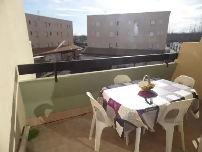 Appartement à Marseillan Plage, Appartement 2 pièces avec mezzanine et parking privé, animaux admis - L882649