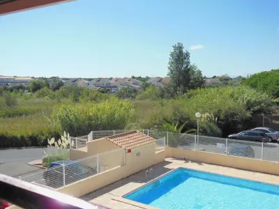 Appartement à Marseillan Plage, Appartement 2 Pièces Mezzanine avec Piscine et Parking, 4 Couchages - L882713