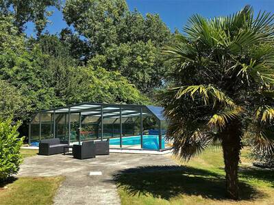Villa de plain-pied avec WIFI, piscine privée sous abris haut à PLEUMEUR-BODOU, Villa 6 personnes à Pleumeur Bodou FR-1-368-86