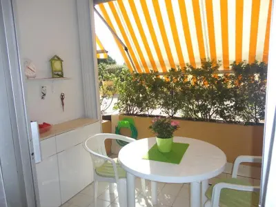 Appartement à Le Grau du Roi, Studio Cabine RDC avec Terrasse - Proche Plage et Commerces - L943905